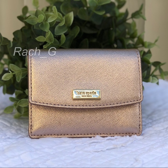 kate spade Handbags - Kate Spade Laurel Way Rose Gold Petty
